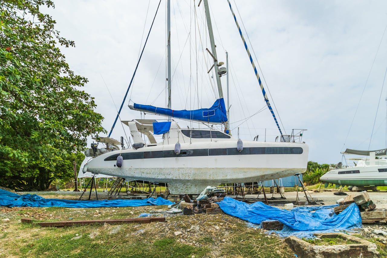 A sailboat resting in a dry dock in Colón, Panama, ready for maintenance.